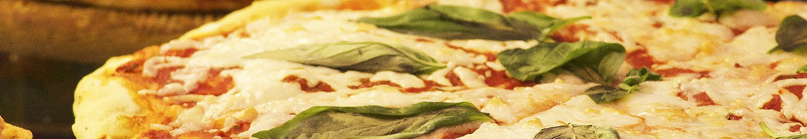 Eating Italian Pizza at Morello's Restaurant & Catering restaurant in Harrisburg, IL.